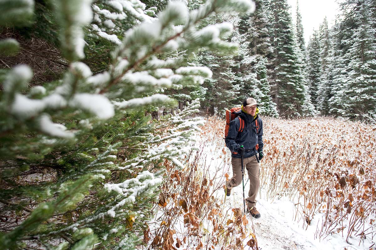 Hiking down trail in snow (Arc'teryx Beta AR hardshell jacket)